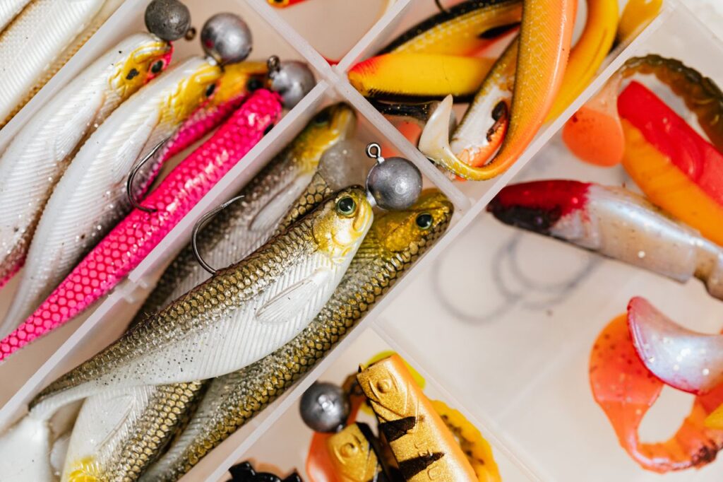 Mastering the First Impression: Your intriguing post title goes here Close-up of colorful fishing lures in a tackle box, perfect for angling enthusiasts.